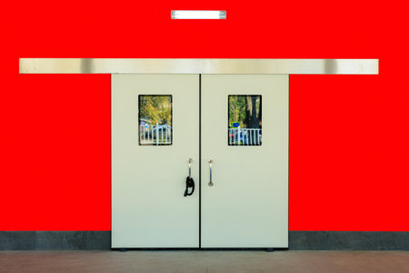 Doors of an emergency room in a hospital. Background with selective focus and copy space for textの写真素材