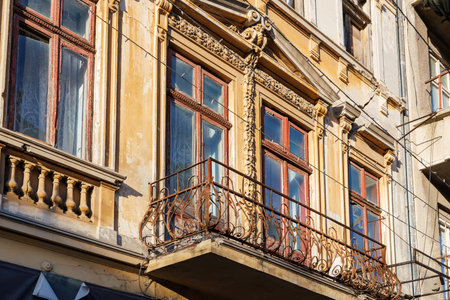 Ornate european architecture with intricate balcony and decorative facade.の写真素材