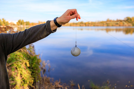 Smart fishing sonar bobber with detailed depth charts.の写真素材