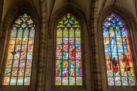 Intricate stained glass windows in historic gothic cathedral interior.. March 22, 2025, Kutna Hora, Czech Republic.のeditorial素材