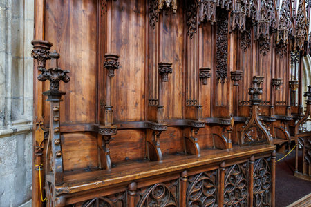 Intricate carved wooden church choir stalls with gothic detailing.. March 22, 2025, Kutna Hora, Czech Republic.のeditorial素材