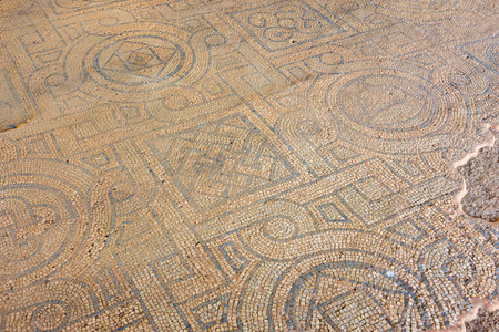 Ancient geometric mosaic tiles with intricate patterns and designs. Authentic ancient Smyrna ruins...