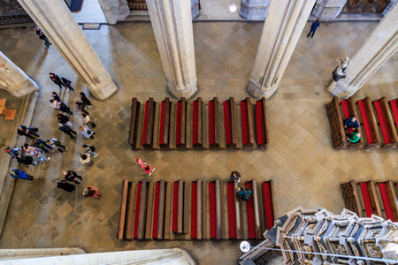 Aerial view of historic cathedral interior with visitors and red benches.. March 22, 2025, Kutna Hora, Czech Republic.のeditorial素材