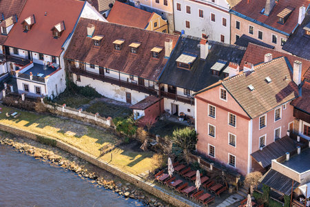 Aerial view of historic european town with riverside buildings and quaint streets. March 20, 2025, Cesky Krumlov, Czechia.のeditorial素材