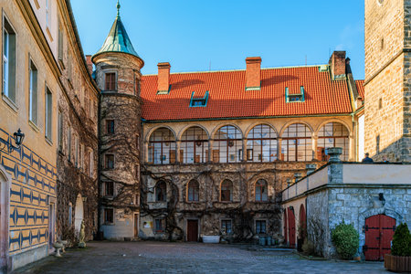Medieval castle courtyard with historic architecture and tower. March 16, 2025, Hruba Skala Castle, Czech Republic.のeditorial素材