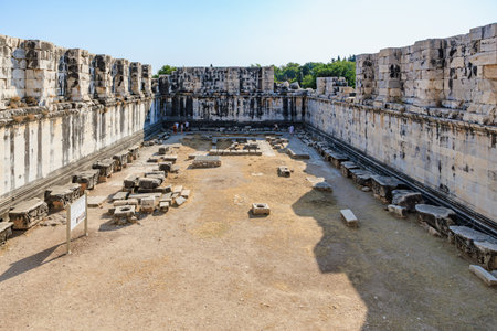 Ancient temple ruins with stone walls and clear sky in daylight. August 8, 2025, 2 Didim Turkey.のeditorial素材