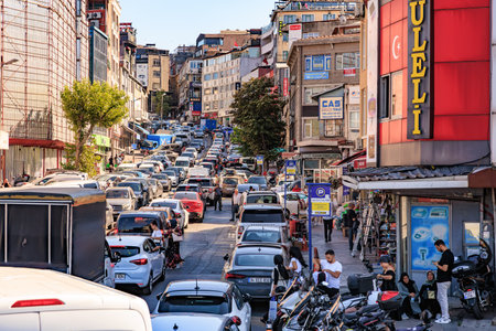 Busy urban street scene with crowded traffic and pedestrians in a vibrant city. August 12, 2025 Istanbul Turkey.のeditorial素材