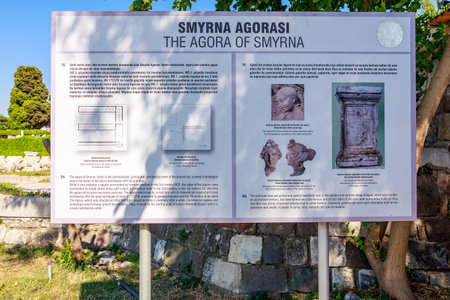 Informative display of ancient smyrna agora with ruins and sculptures. August 4, 2025, Izmir Turkey.のeditorial素材