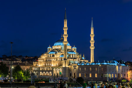 Illuminated sultan ahmed mosque at night with clear sky and crowd gathered. August 12, 2025 Istanbul Turkey.のeditorial素材