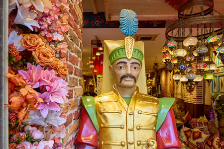 Colorful turkish themed decor with ottoman soldier statue and lanterns. August 10, 2025, Istanbul Turkey.のeditorial素材