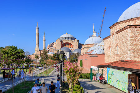 Hagia sophia exterior view with visitors on a sunny day in istanbul. August 12, 2025 Istanbul Turkey.のeditorial素材