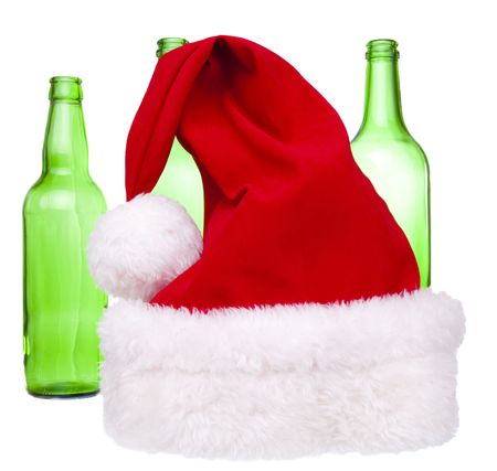 Santa hat and a bottle in the backgroundの写真素材