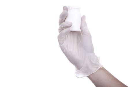 hand in gloves holding a jarの写真素材