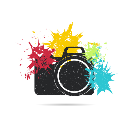Photo camera on background with color spots. Grunge vector illustrationのイラスト素材