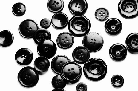 black buttons on white isolated backgroundの写真素材