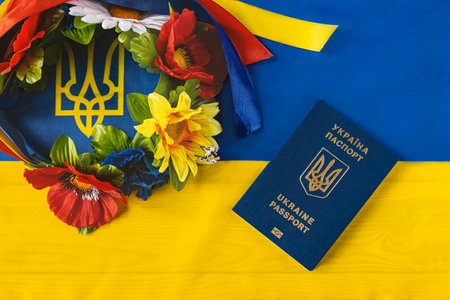 Ukrainian Passport and flowers on the flag of Ukraine.の写真素材