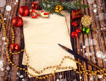 Christmas letter with decorations on wooden background. Copy space for your text.の写真素材