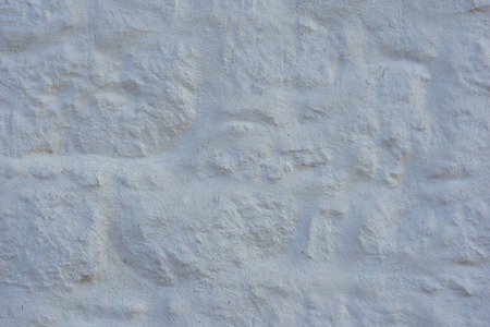 Rough natural stone seamless marble texture surface with cracks, dents, sharp edges. Gray grungy textured backdropの写真素材