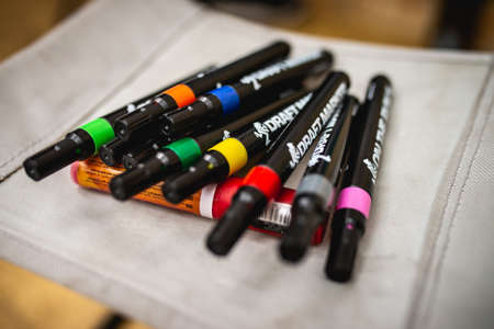 Novokuznetsk, Kemerovo Oblast / Russia - 09/19: street art week festival. A bunch of colored markers on the chairのeditorial素材