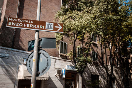 A road sign pointing to the Enzo Ferrari Museum on September 21, 2018 in Modena, Italy