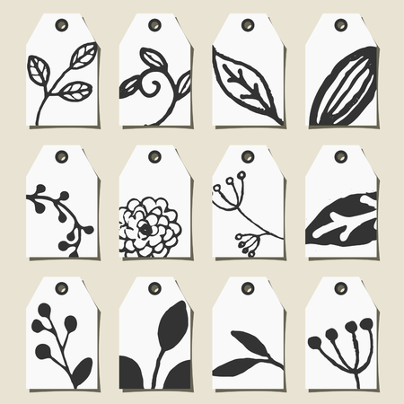 A set of twelve hand drawn floral design labels in black and white.のイラスト素材
