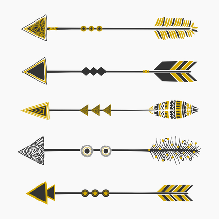 A set of five arrows, tribal decoration in black and golden, isolated on white.のイラスト素材