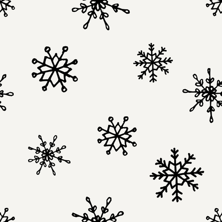 Seamless repeating pattern with hand drawn snowflakes in black and cream. Minimalist festive textile, gift wrap, wall art design.のイラスト素材
