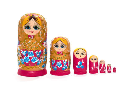 Bright colored nesting dolls on a white background. Russian national souvenir. Matryoshka. High quality photoBright colored nesting dolls on a white background. Russian national souvenir. Matryoshka.の写真素材