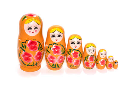 Bright colored nesting dolls on a white background. Russian national souvenir. Matryoshka. High quality photoBright colored nesting dolls on a white background. Russian national souvenir. Matryoshka.の写真素材