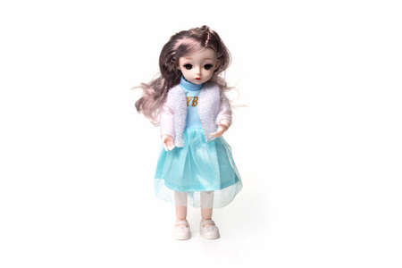 Ceramic toy doll isolated on white background.の写真素材