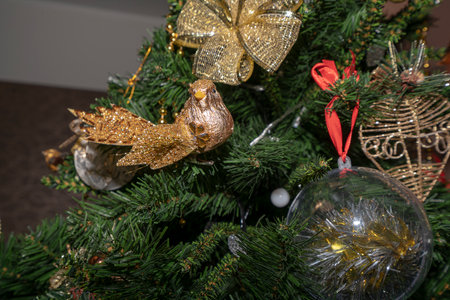 Gold Christmas background of decorated Christmas treeの写真素材