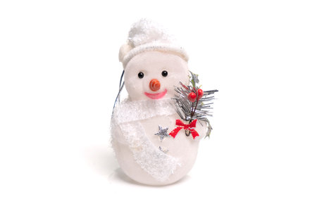Cute small snowman toy isolated on white. Christmas decorationの写真素材