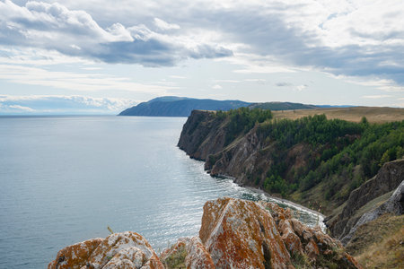 Beautiful summer landscape of Baikal Lake on sunny day. View of the rocky capeの写真素材