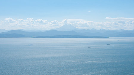 Avacha Bay of the Pacific Ocean mountains and blue skies. Kamchatka Peninsula.の写真素材