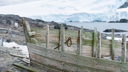 Remains of an old wooden whaling boat on the beachの写真素材