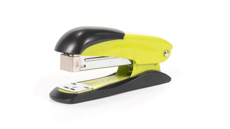 Yellow handy stapler isolated on white backgroundの写真素材