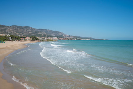 Beach on a sunny day. Mediterranean coast, sea. Alcossebre, Valencia Spain.の写真素材