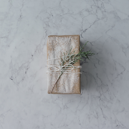 DIY Christmas gift wrapping on marble background. Minimal concept.の写真素材