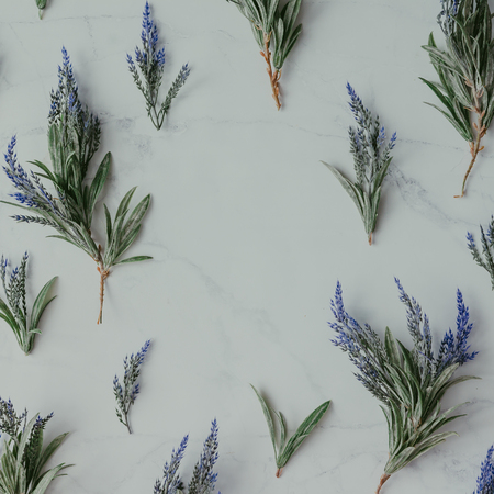 Creative mock up layout made of lavender branches with copy space on table. Homemade flat lay concept.の写真素材