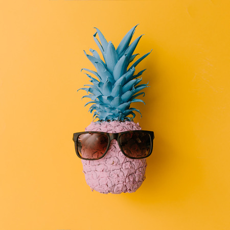 Pineapple in pastel colors with sunglasses