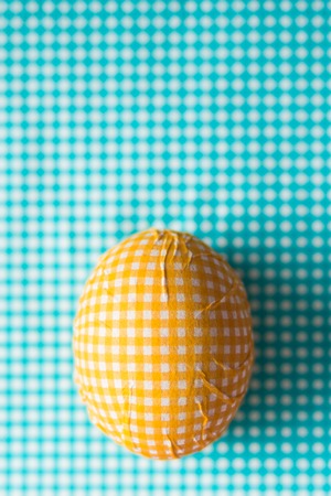 Top view of Easter egg decorated with paper napkinの写真素材