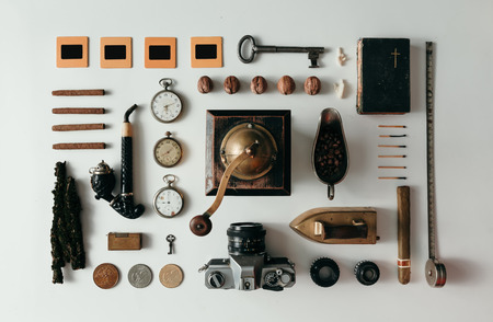 Top view of creative arrangement of vintage travel things on deskの写真素材