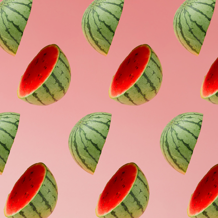 Watermelon slice pattern on pastel pink background. Minimal fruit concept.の写真素材