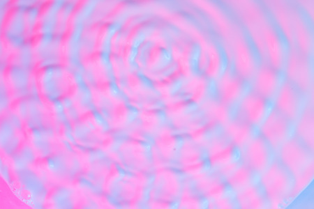 Abstract background pattern in neon pink and purple colors. Ultra violet concept.の写真素材