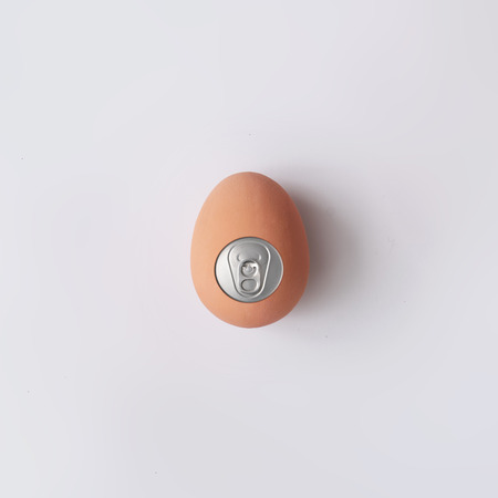 Egg with soda can lid. Creative food concept. Easter minimal.の写真素材