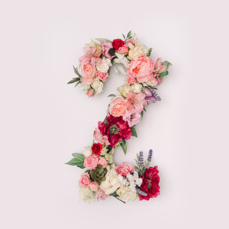 Number 2 made of real natural flowers and leaves. Flower font concept. Unique collection of letters and numbers. Spring, summer and valentines creative idea.の写真素材