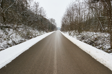 Ice on asphalt road.