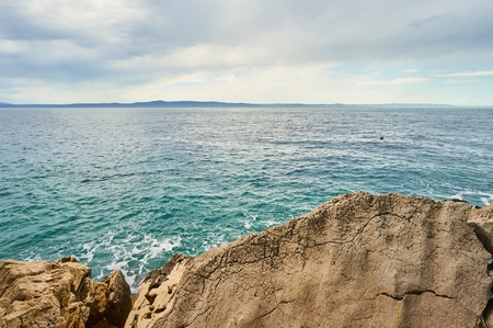 Rocks and beach near Adriatic sea in Croatia.の写真素材