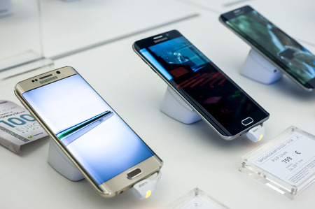 BARCELONA, SPAIN - FEBRUARY 27, 2016: New Samsung Galaxy phones at Mobile World Centre of Barcelona.