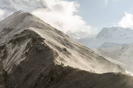Hiking people on trail in Himalaya